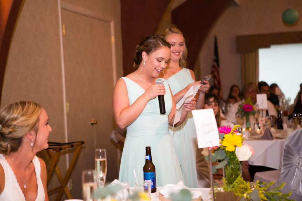 Brides sisters giving a toast