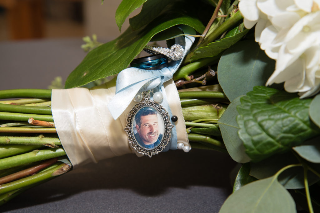 bride's bouquet with charm of brother who passed