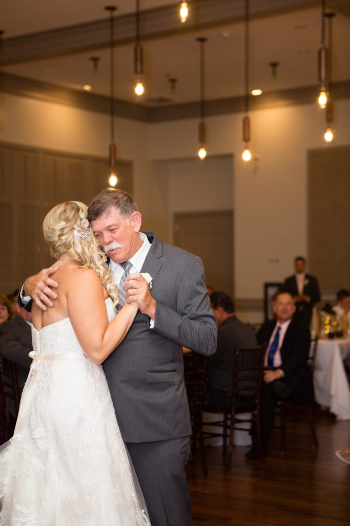 bride and step father dancing