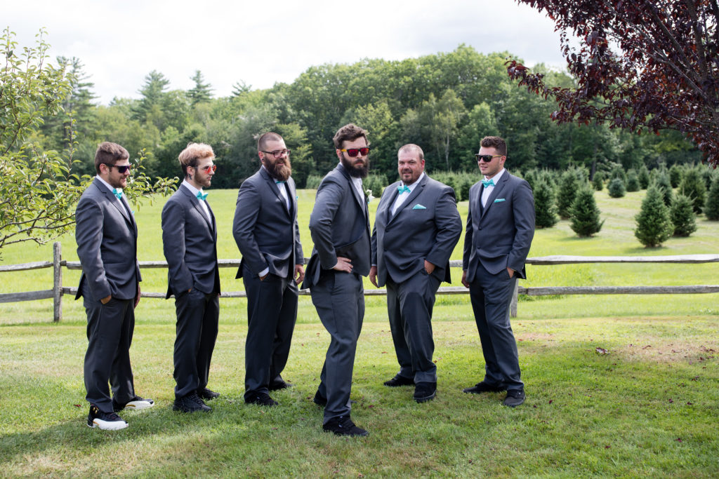 groom being silly with his groomsmen