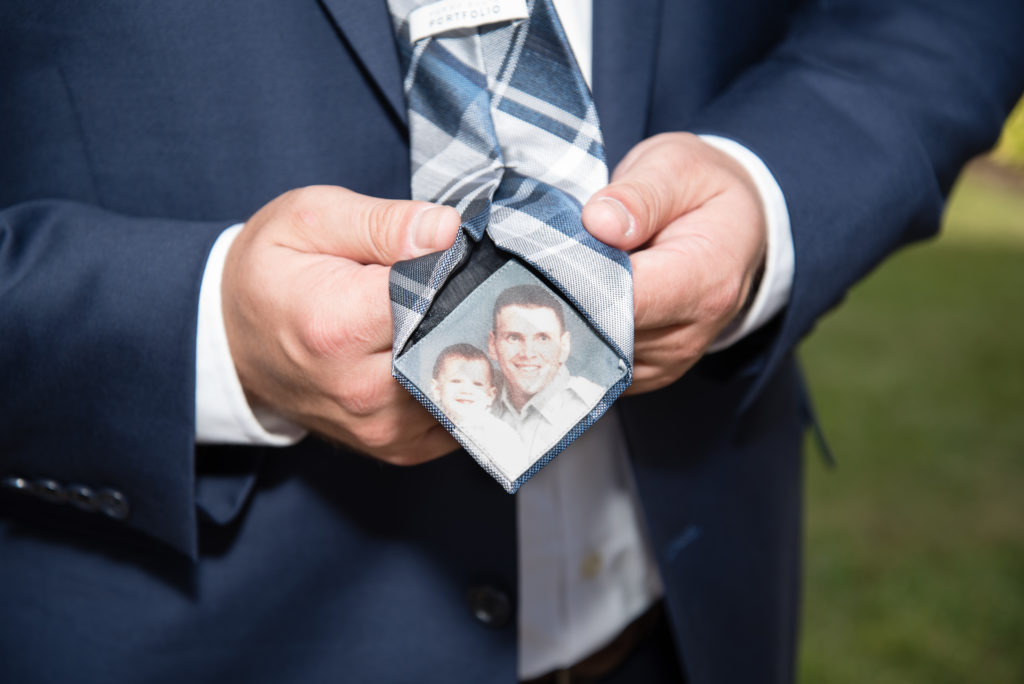 groom's tie with picture of him and deceased father