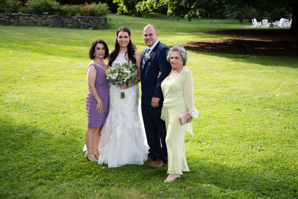 Bride and groom with mom and grandma