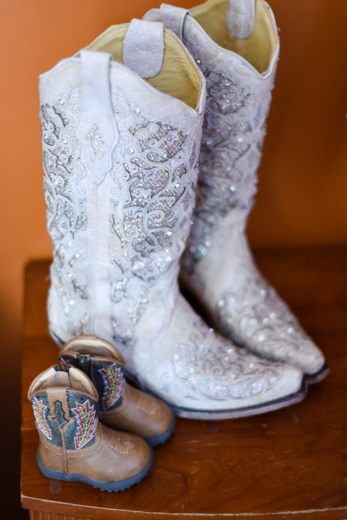 bride's cowboy boots with matching boots for her son