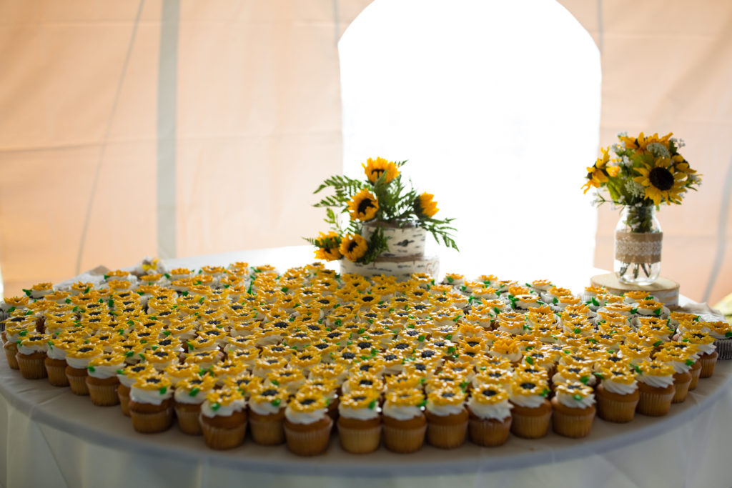sunflower cupcakes and wedding cake