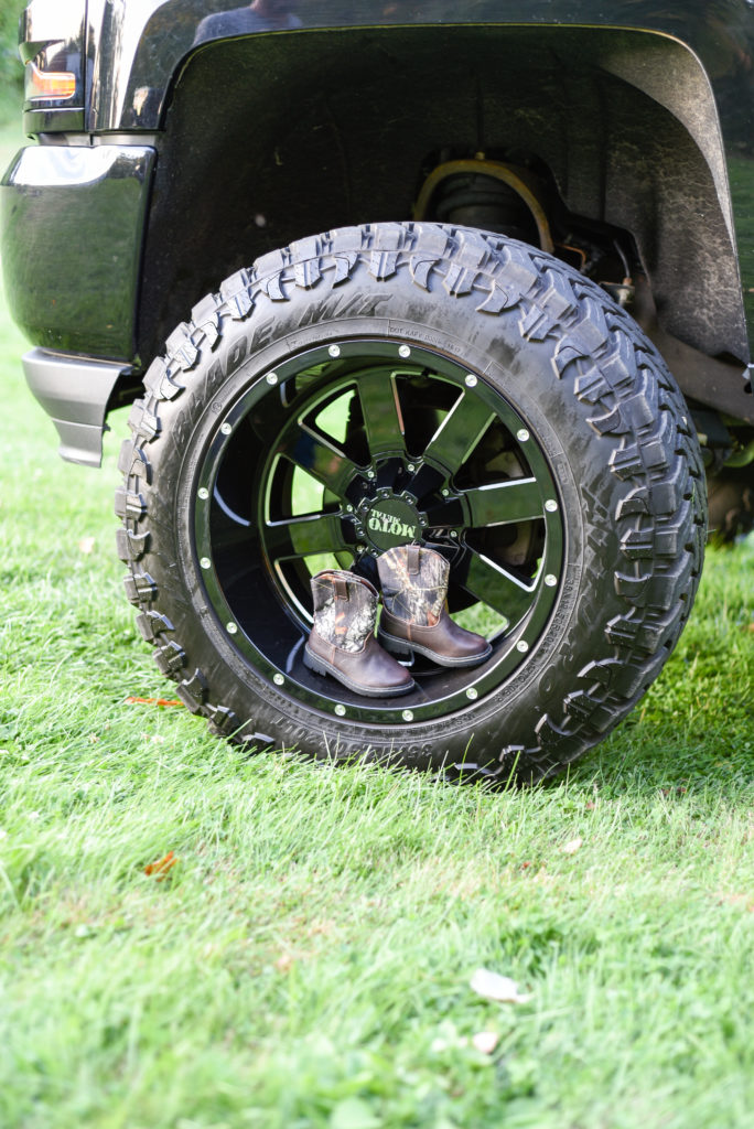 baby boots set in tire of truck