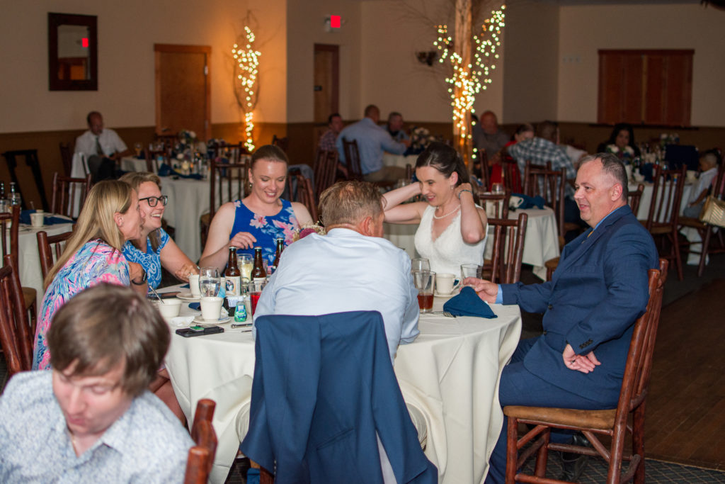 bride and groom mingling with their guests at woodstock inn brewery
