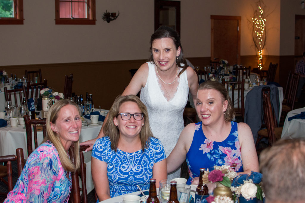 bride with her friends at the reception at woodstock inn brewery