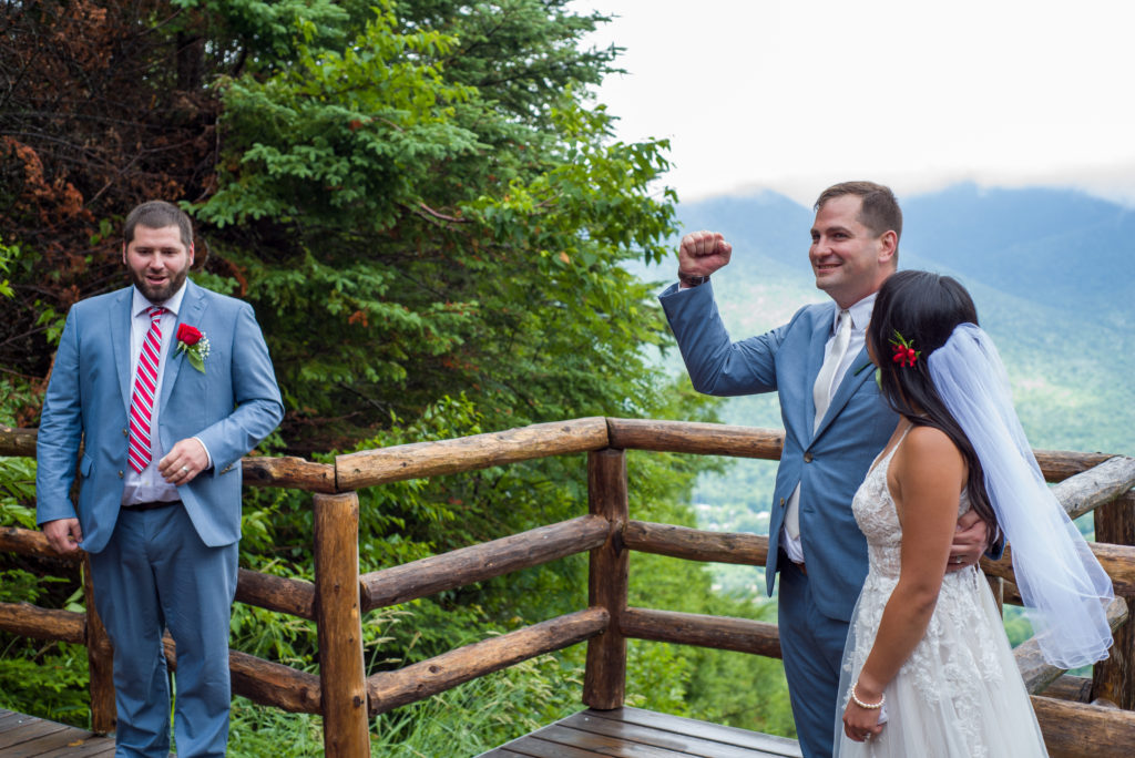 groom flexing while his brother gives a speech about how they used to wrestle for the tv remote 