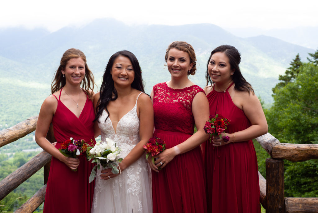 bride with her bridesmaids at mountain top wedding