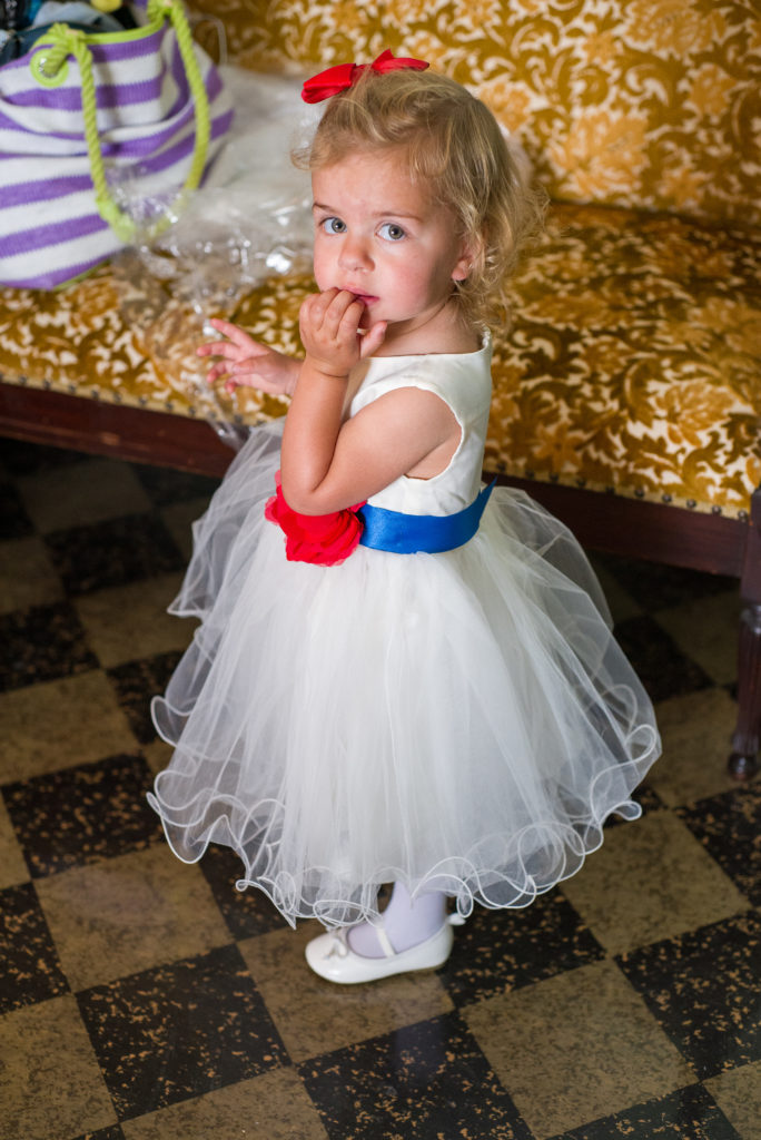 flower girl in her red white and blue dress