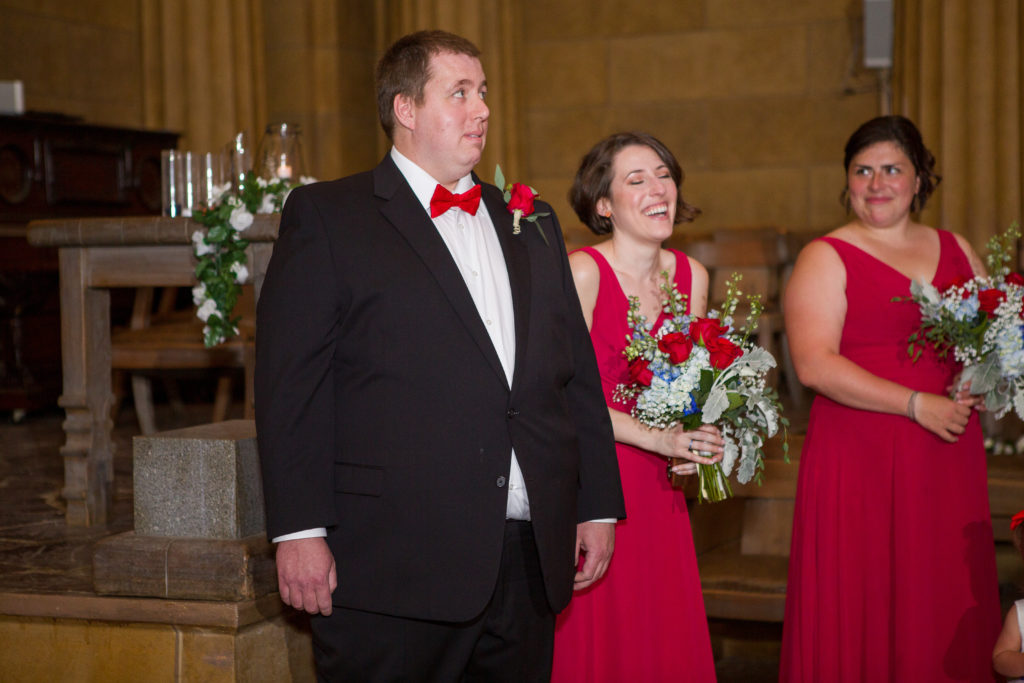groom waiting for bride to walk down the aisle in the masonic temple