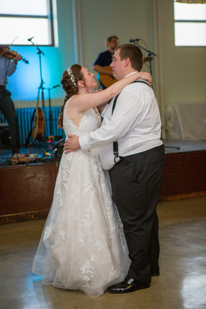 last slow dance as bride and groom before reception ends