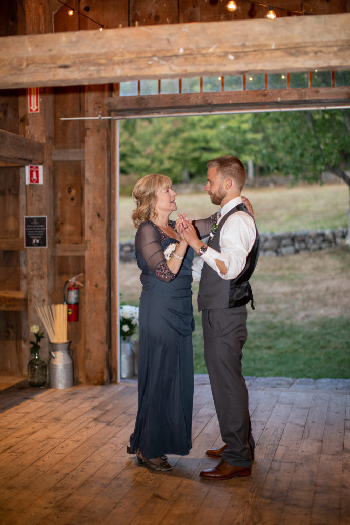 groom dancing with his mom at Barn at Moody Mountain Farm Wedding