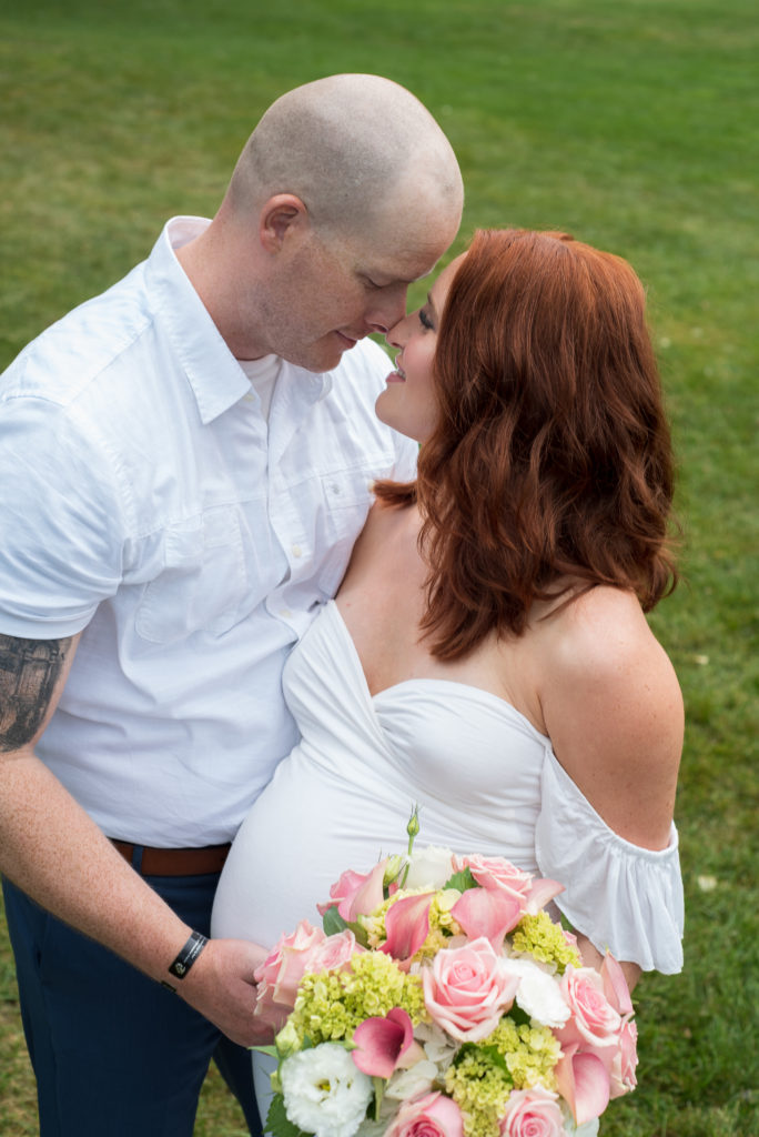 bride and groom nuzzling in park at York Harbor Inn elopement