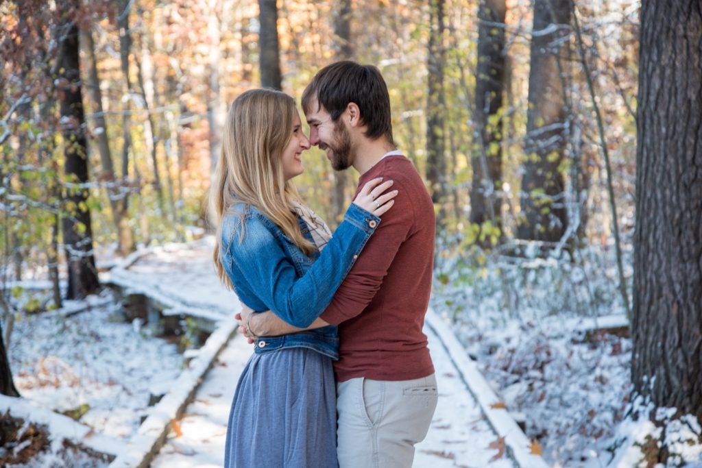 2020 engagement Jonathan and Elizabeth nuzzling noses during a winter session