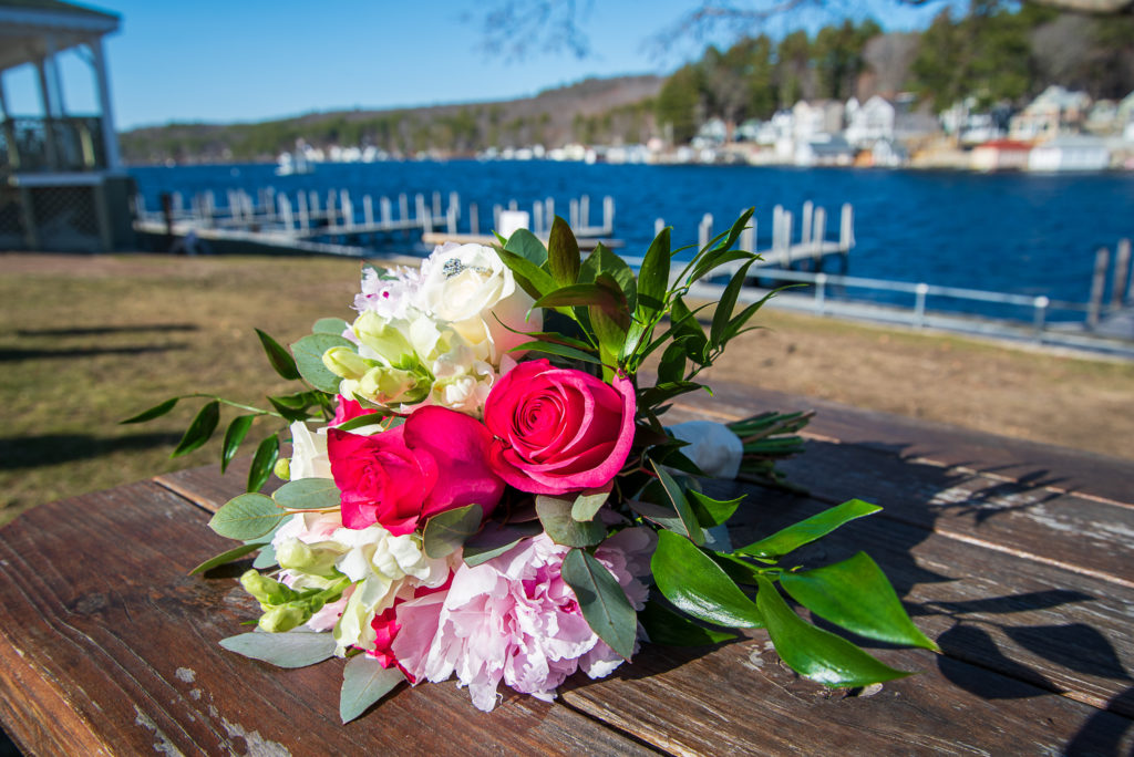 floral bouquet with lake in the background