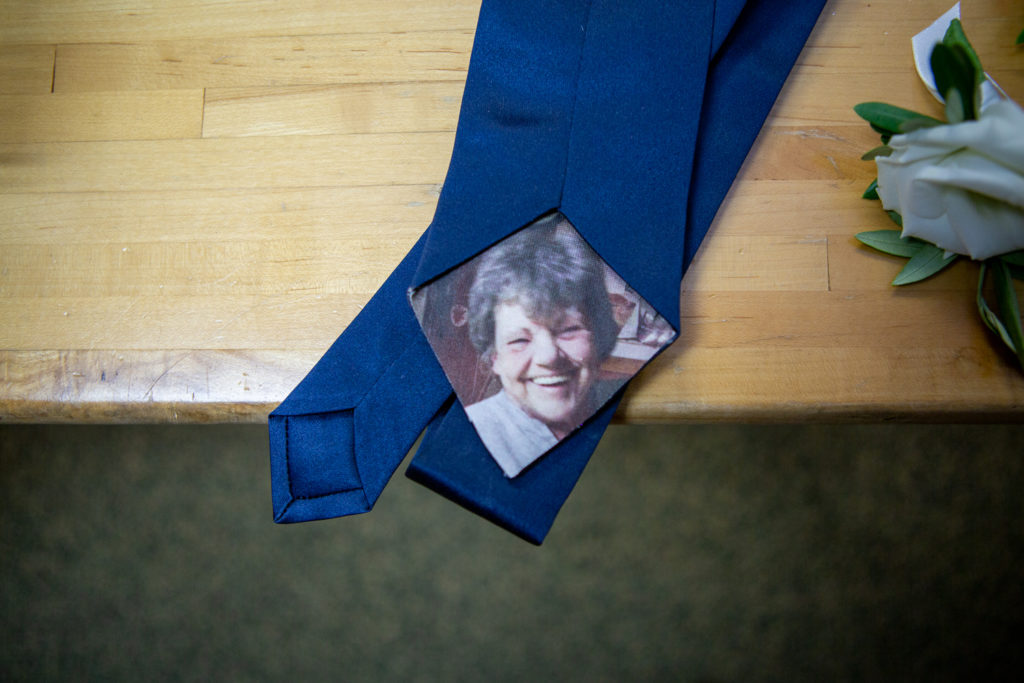 picture of deceased grandmother on groom's navy tie