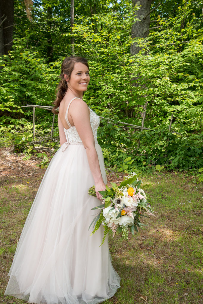 bride with her floral bouquet