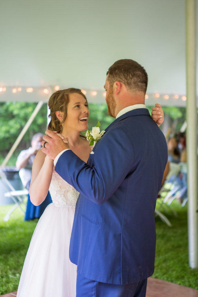 first dance as bride and groom at backyard summer wedding