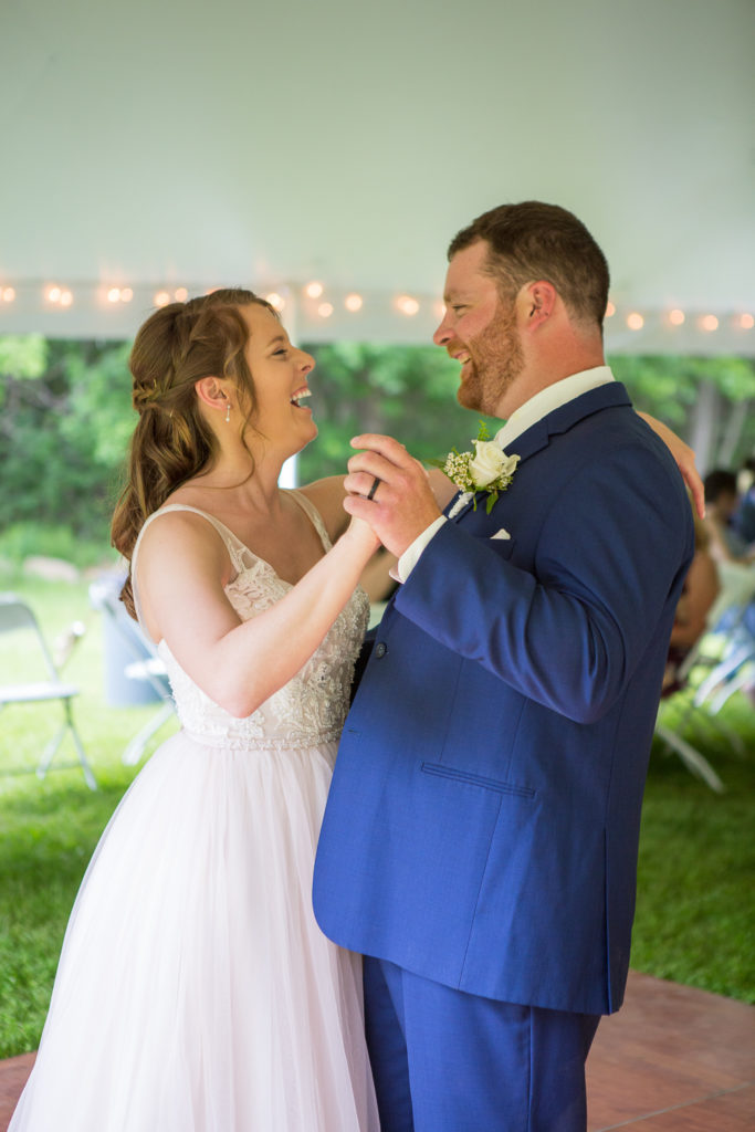 first dance as bride and groom at backyard summer wedding