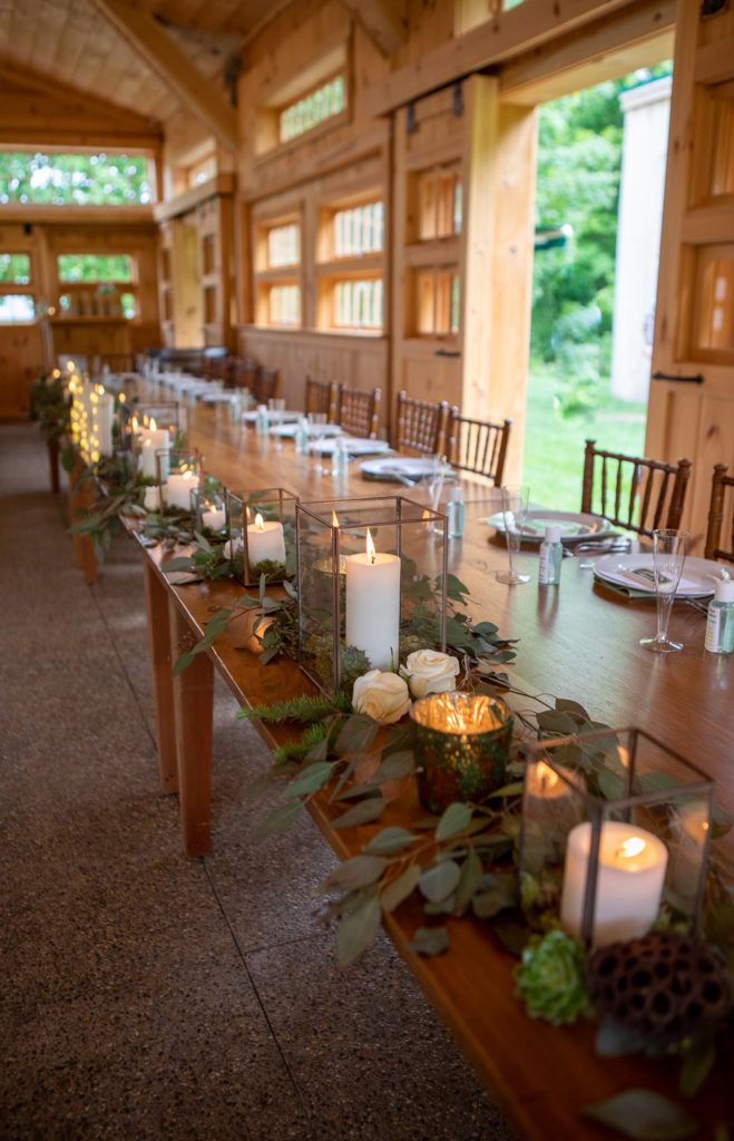 rustic elegant table decor inside reception barn at locke falls farm