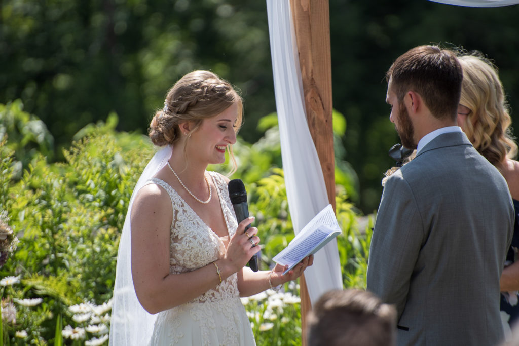 bride reading her vows to the groom