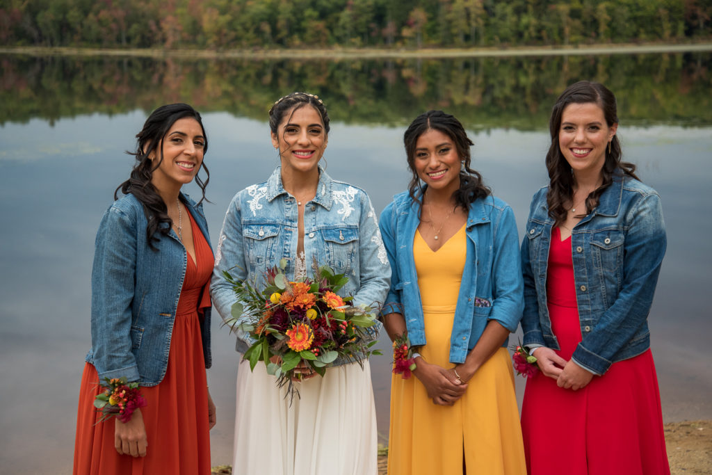 bride with her bridesmaids in jean jackets, shot by NH wedding Photographer