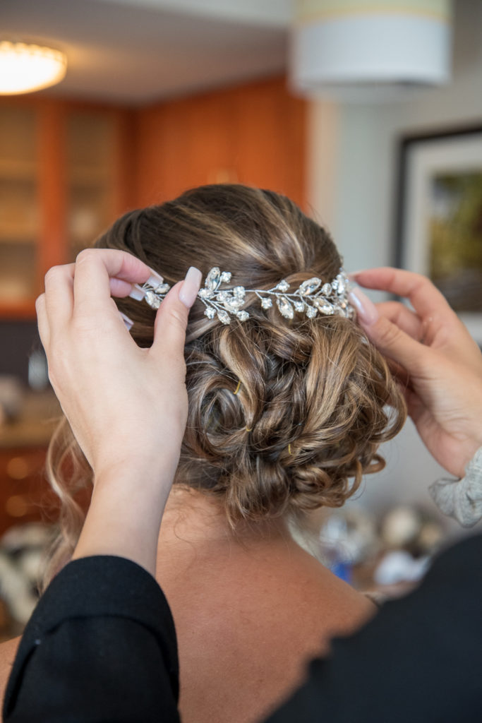 hair piece going in the bride's hair
