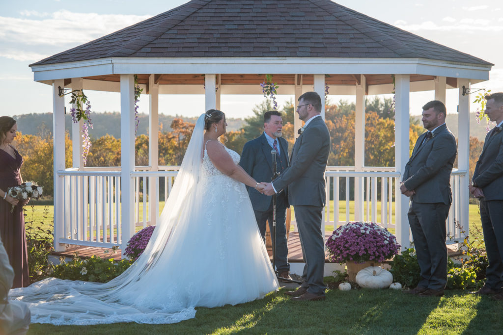 wedding ceremony in front of the gazebo at the perfect fall wedding