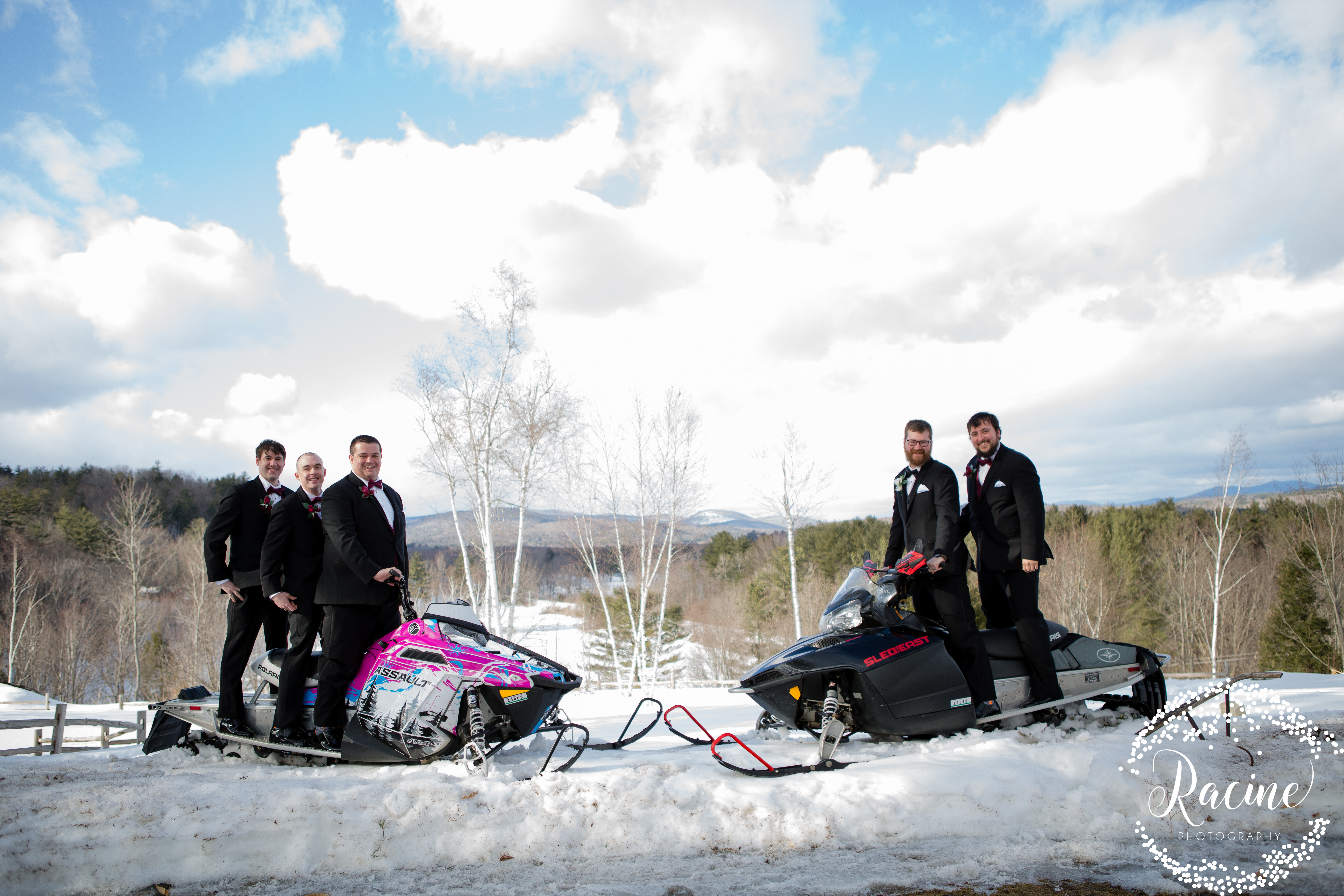 groomsmen on the snowmobiles