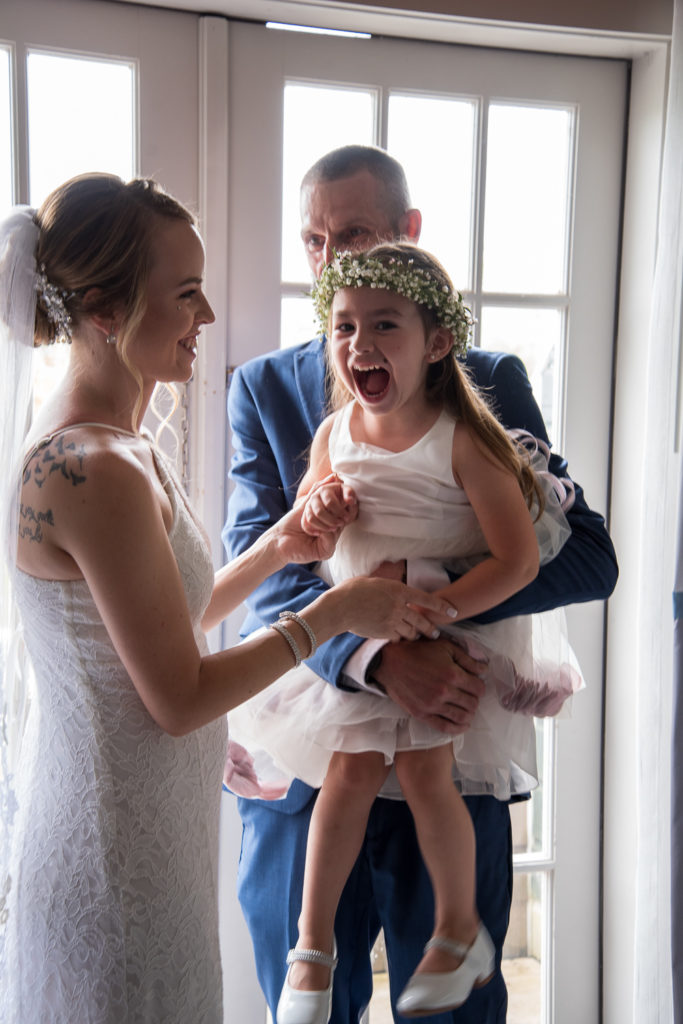 bride with her daughter laughing