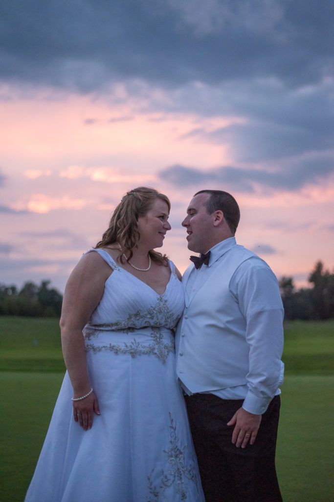 bride and groom at sunset at The Oaks Somersworth NH wedding
