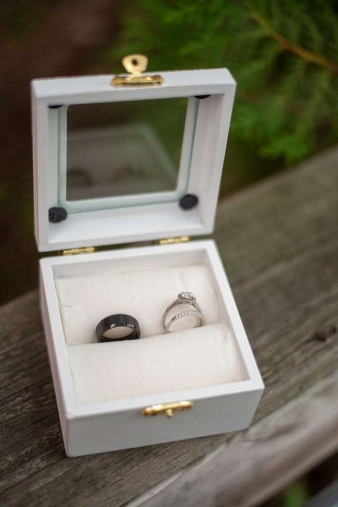 Derek & Tiffany (bride and groom) wedding rings in a box 