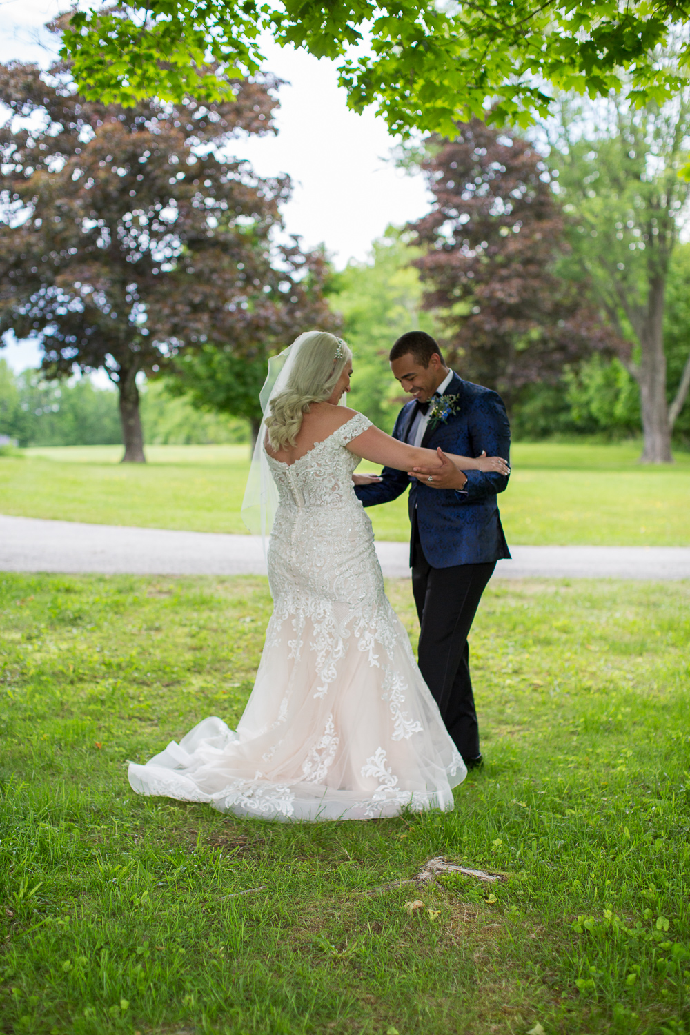 groom turning back to look at his bride for the first time on the perfect day