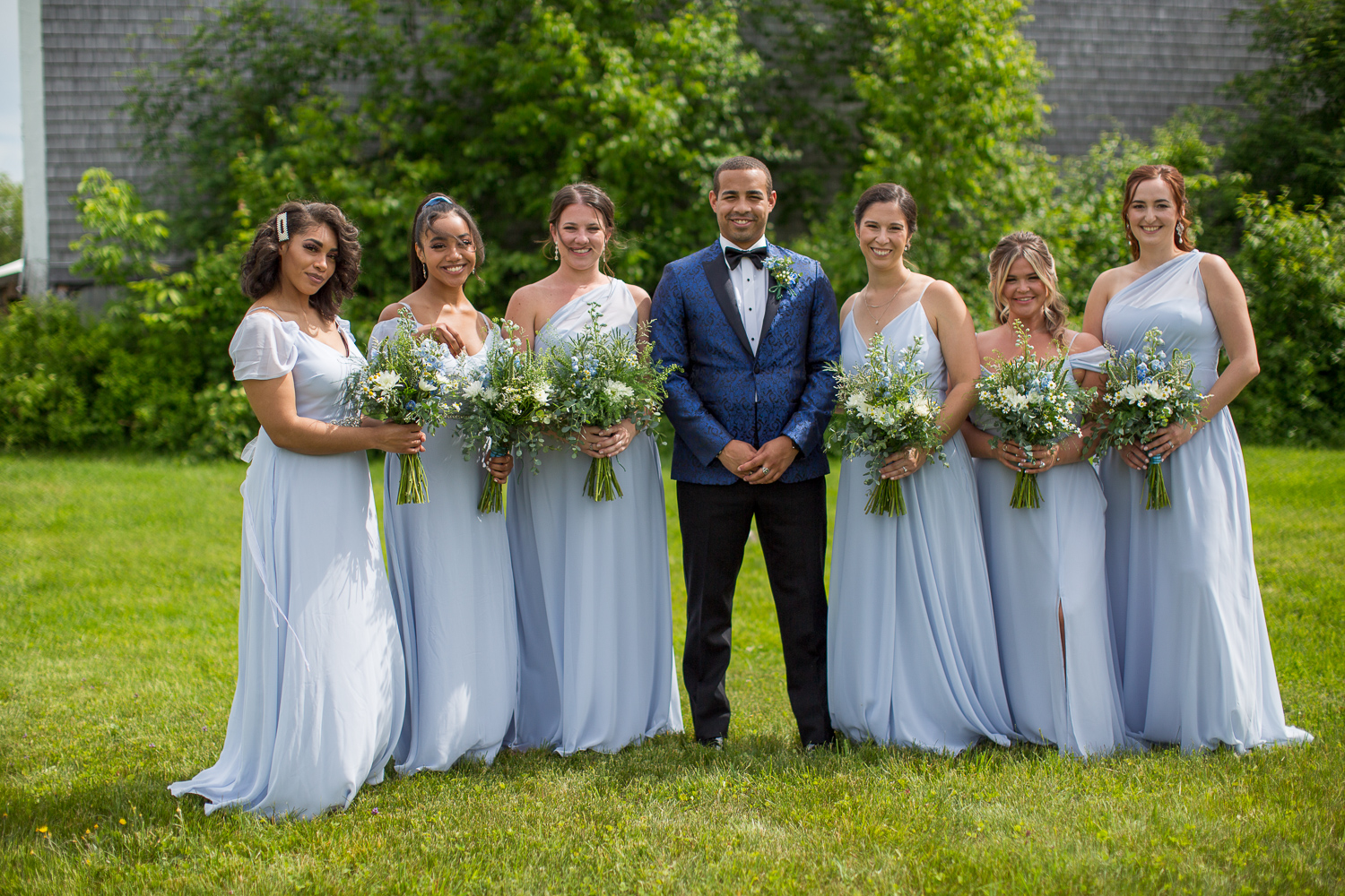 groom with the bridesmaids at the perfect day