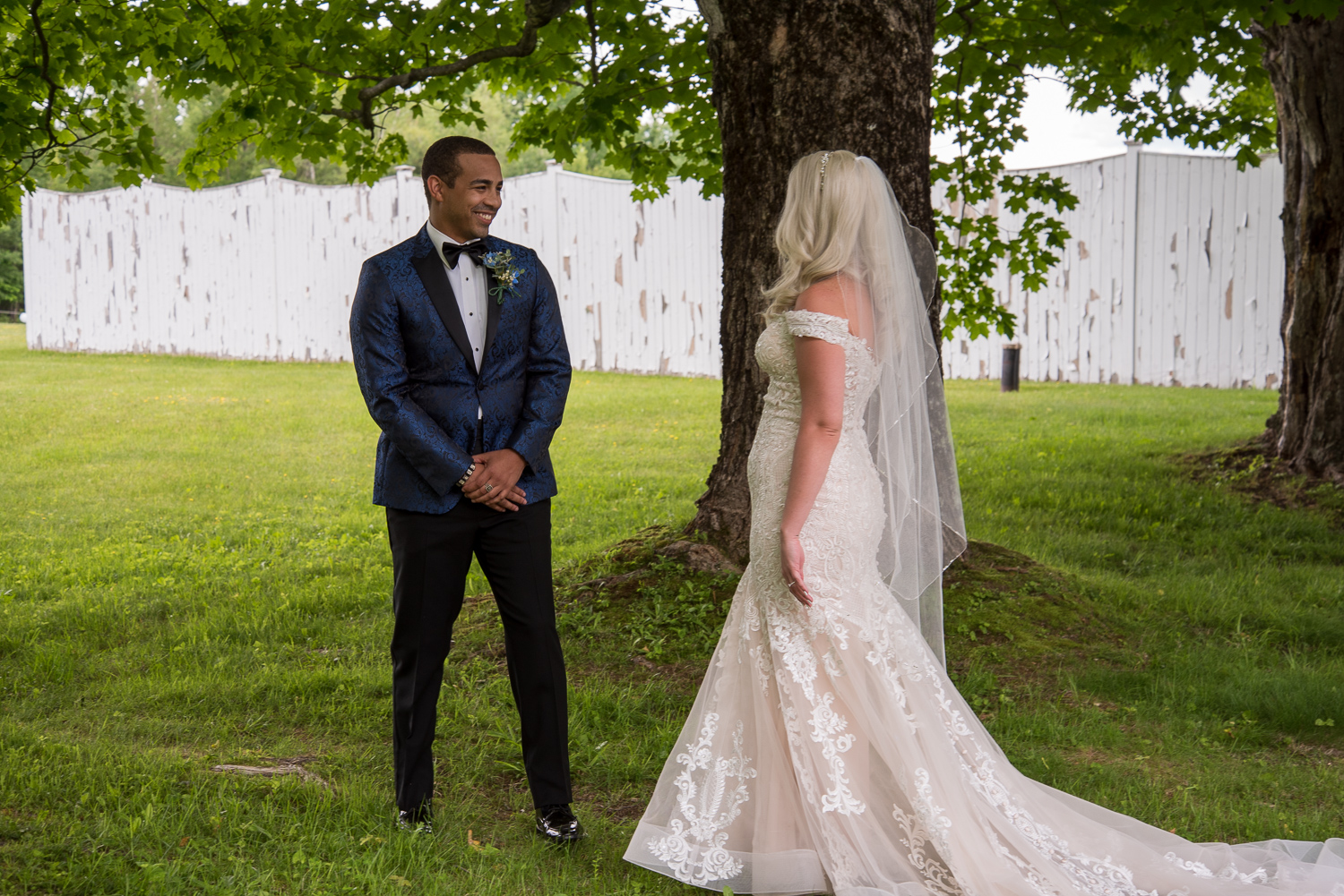 groom turning back to look at his bride for the first time on the perfect day