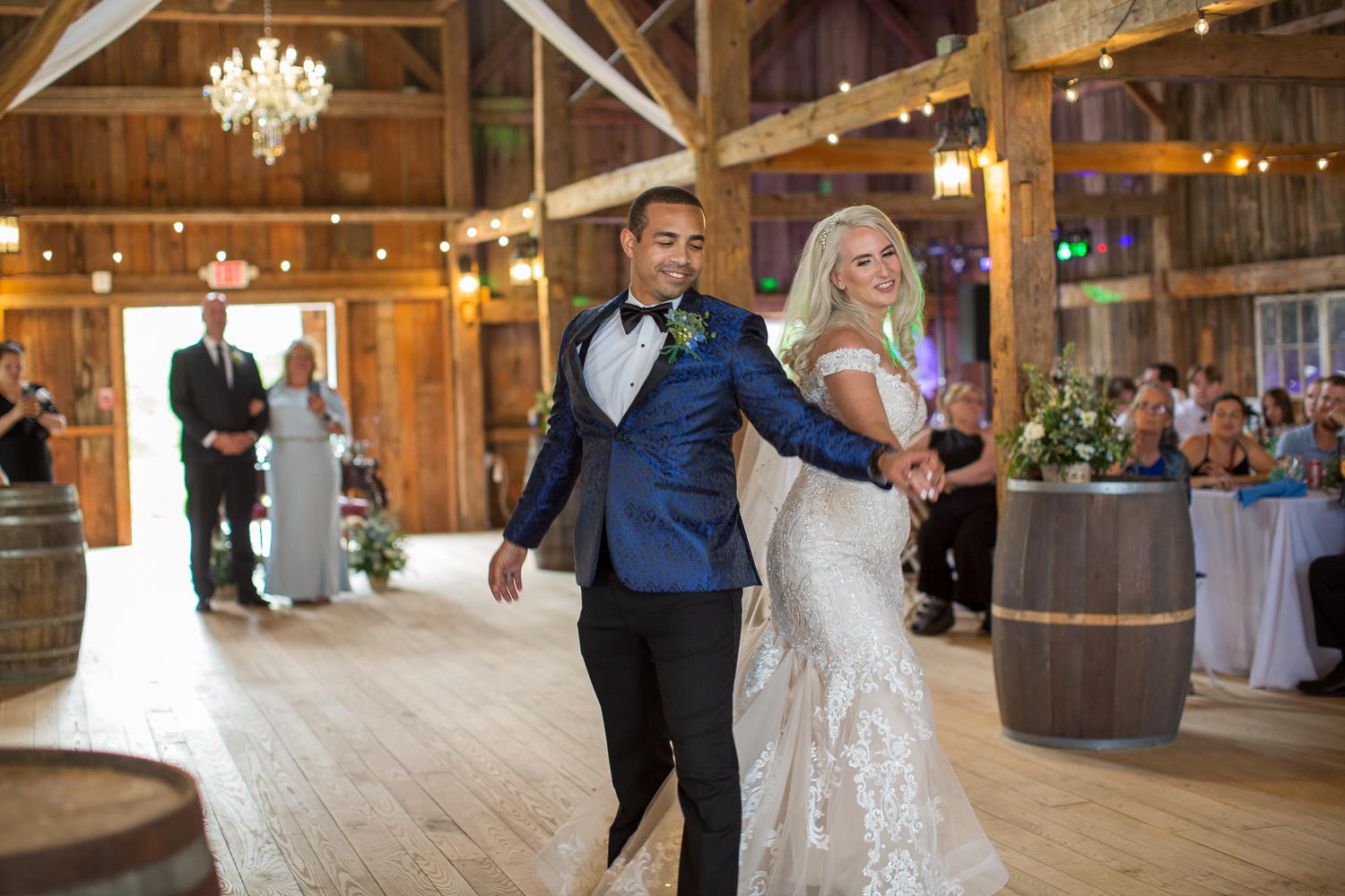 bride and groom first dance in the whitney farm estate barn at the perfect day