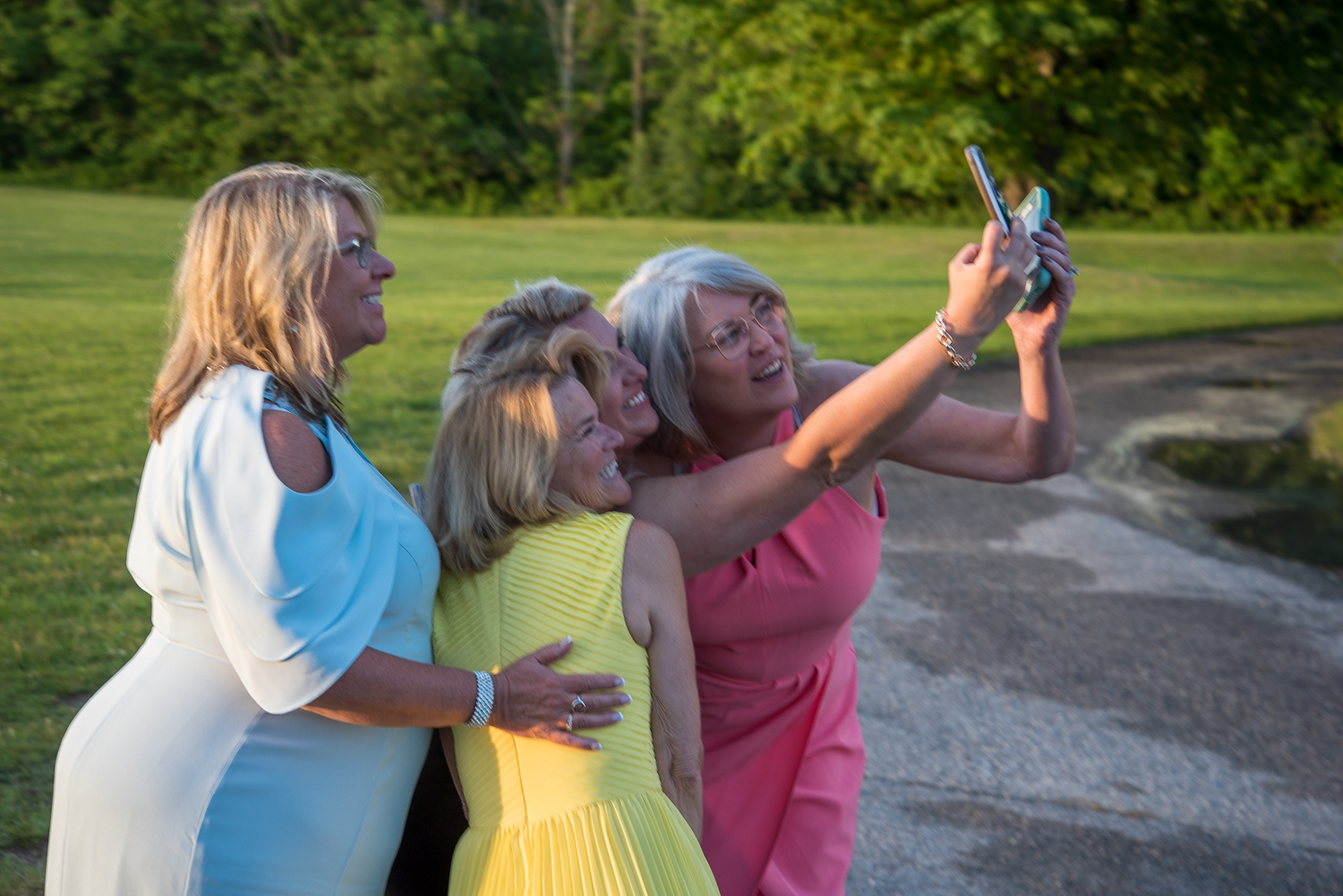 mother of the bride with her friends taking a selfie at the perfect day 