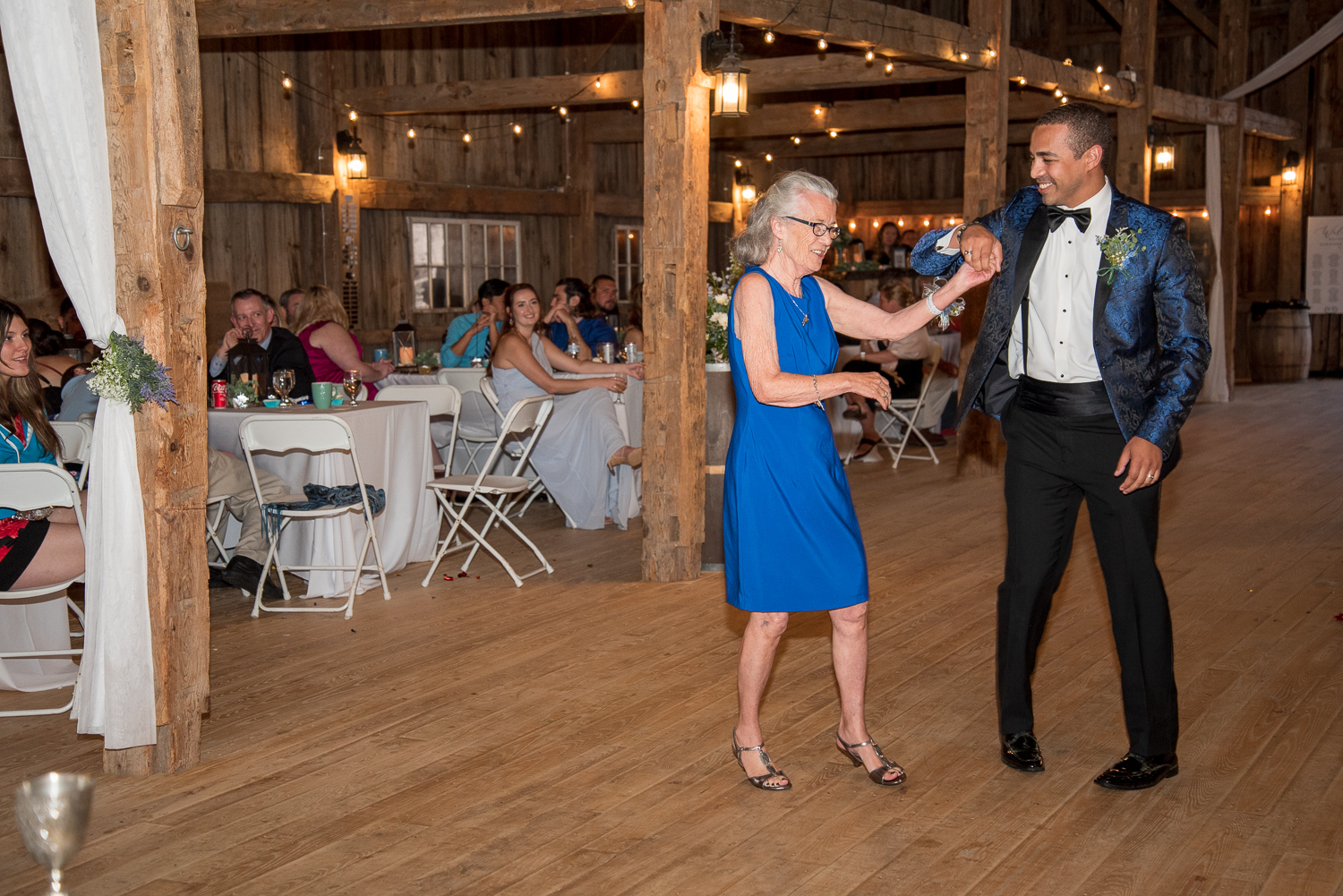 groom dancing with his grandmother at the perfect day at whitney farm estate