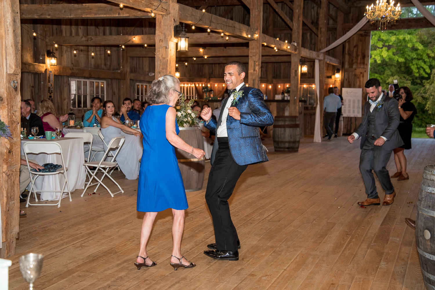 groom dancing with his grandmother at the perfect day at whitney farm estate