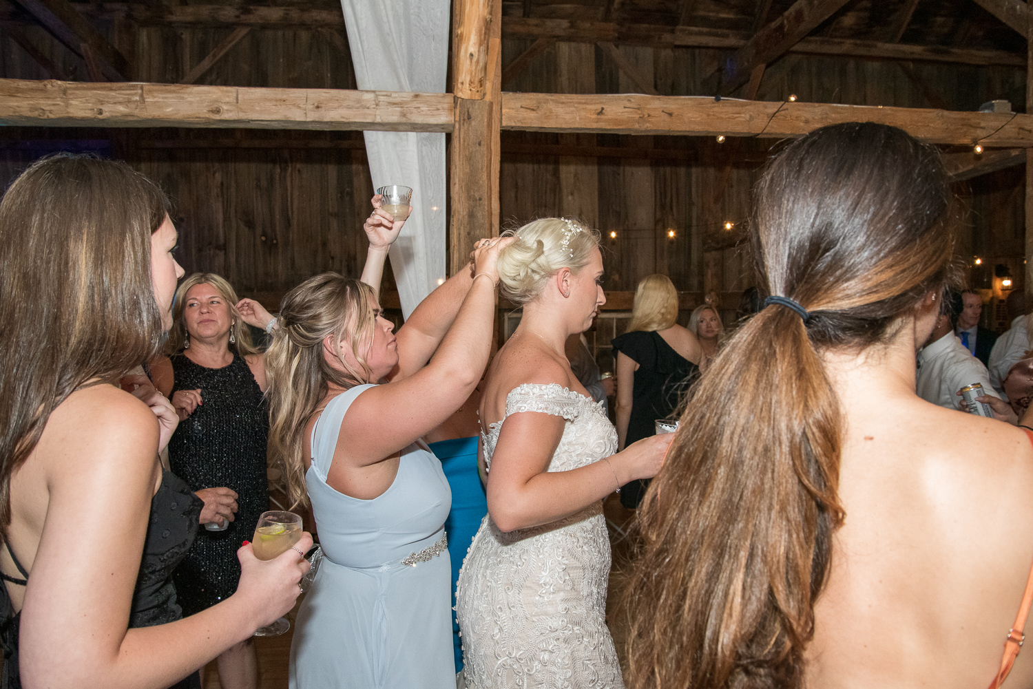 wedding guests dancing and having fun at the perfect day at whitney farm estate 
