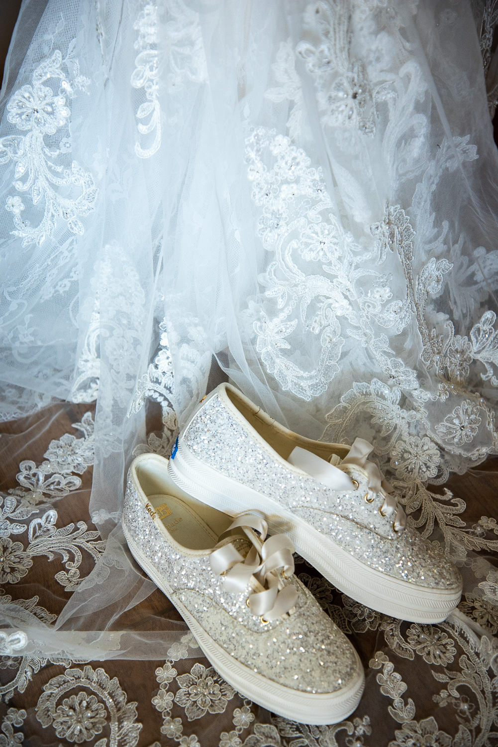 Brides reception shoes on the wedding dress