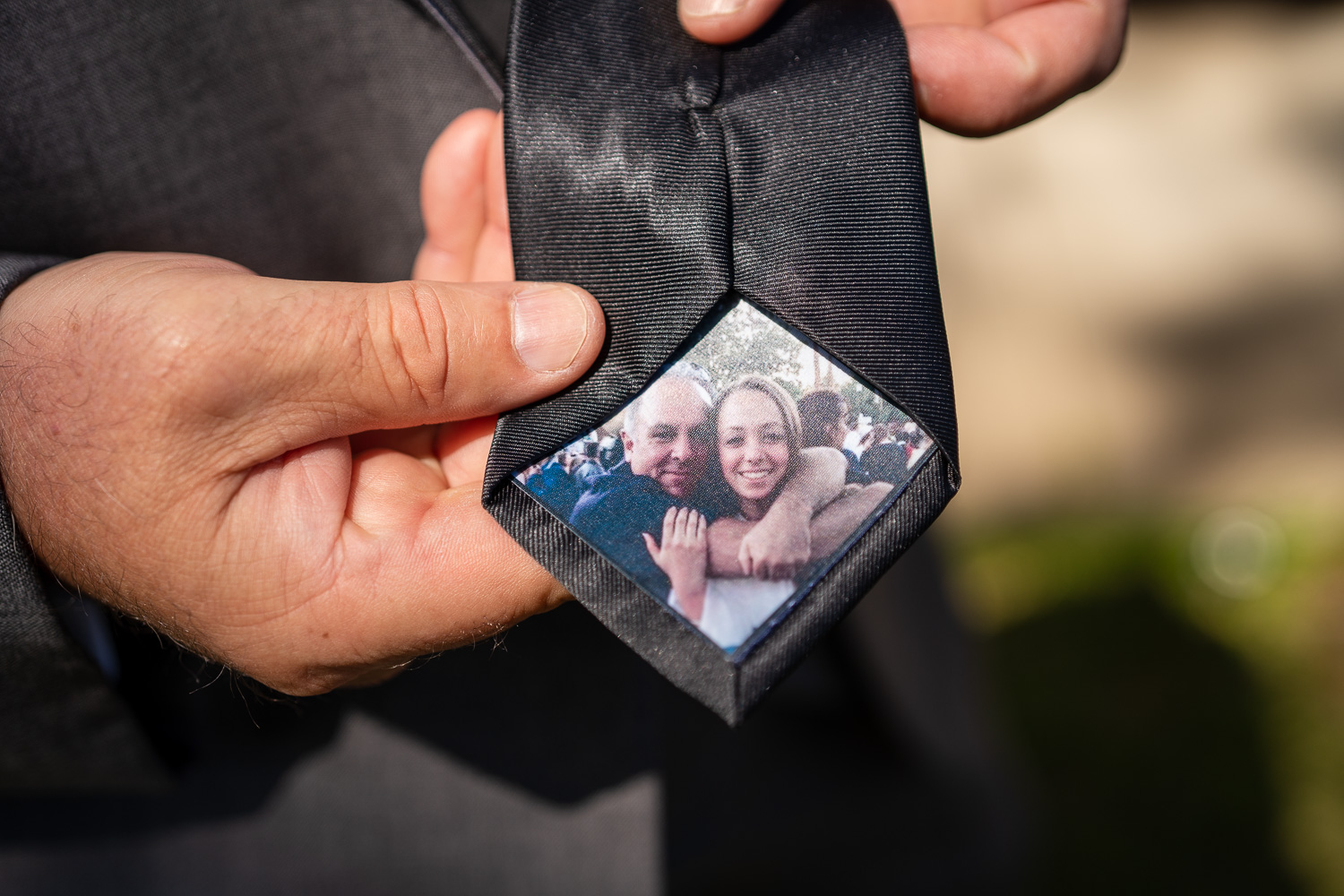 Tie of the brides dad with a photo of bride and dad on it