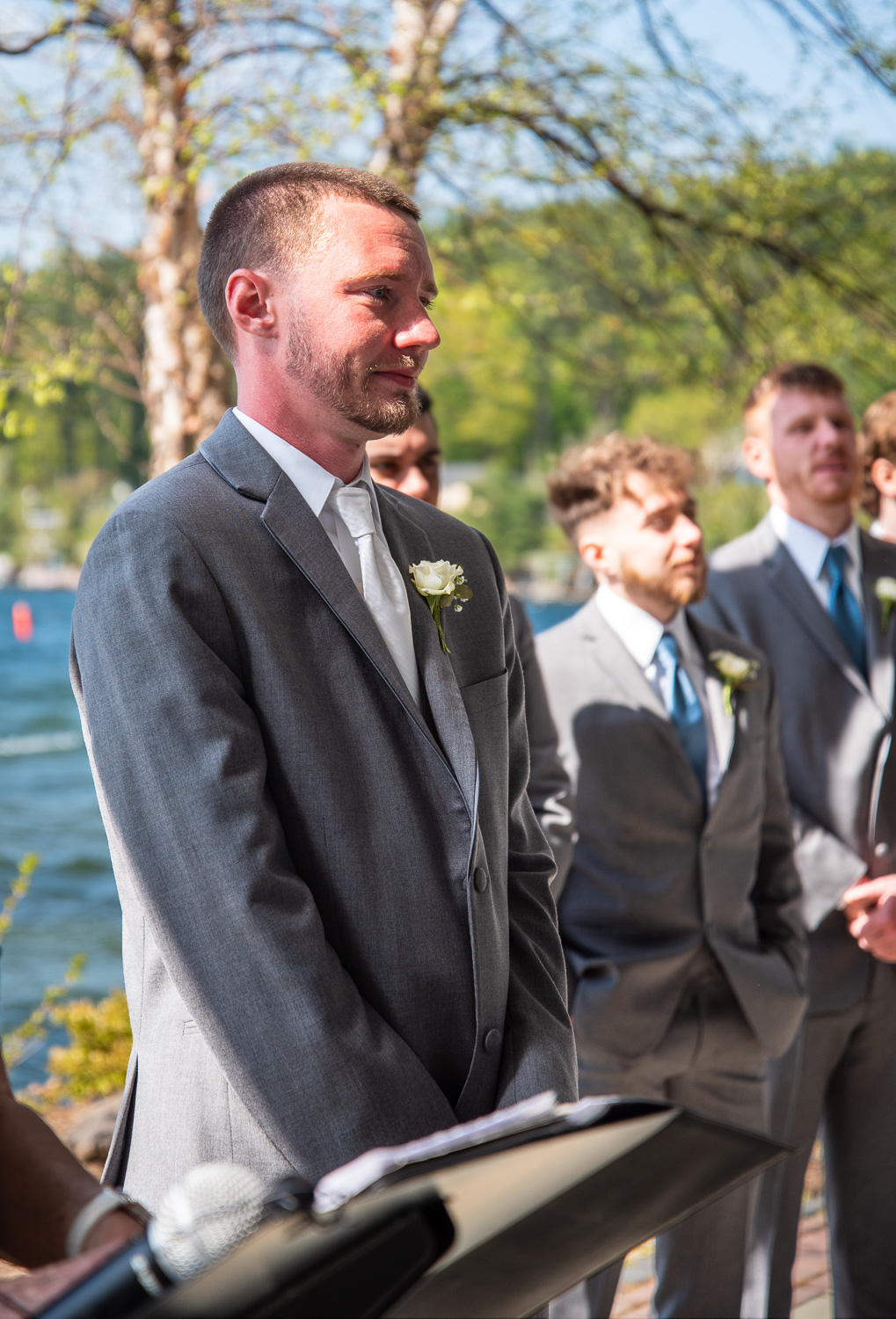 Groom seeing bride walking down the aisle for the first time