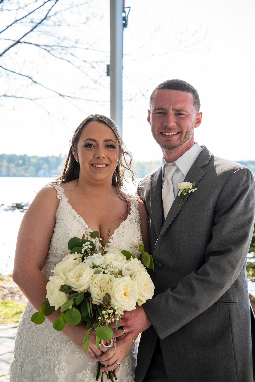 Bride and groom after the lakeside wedding