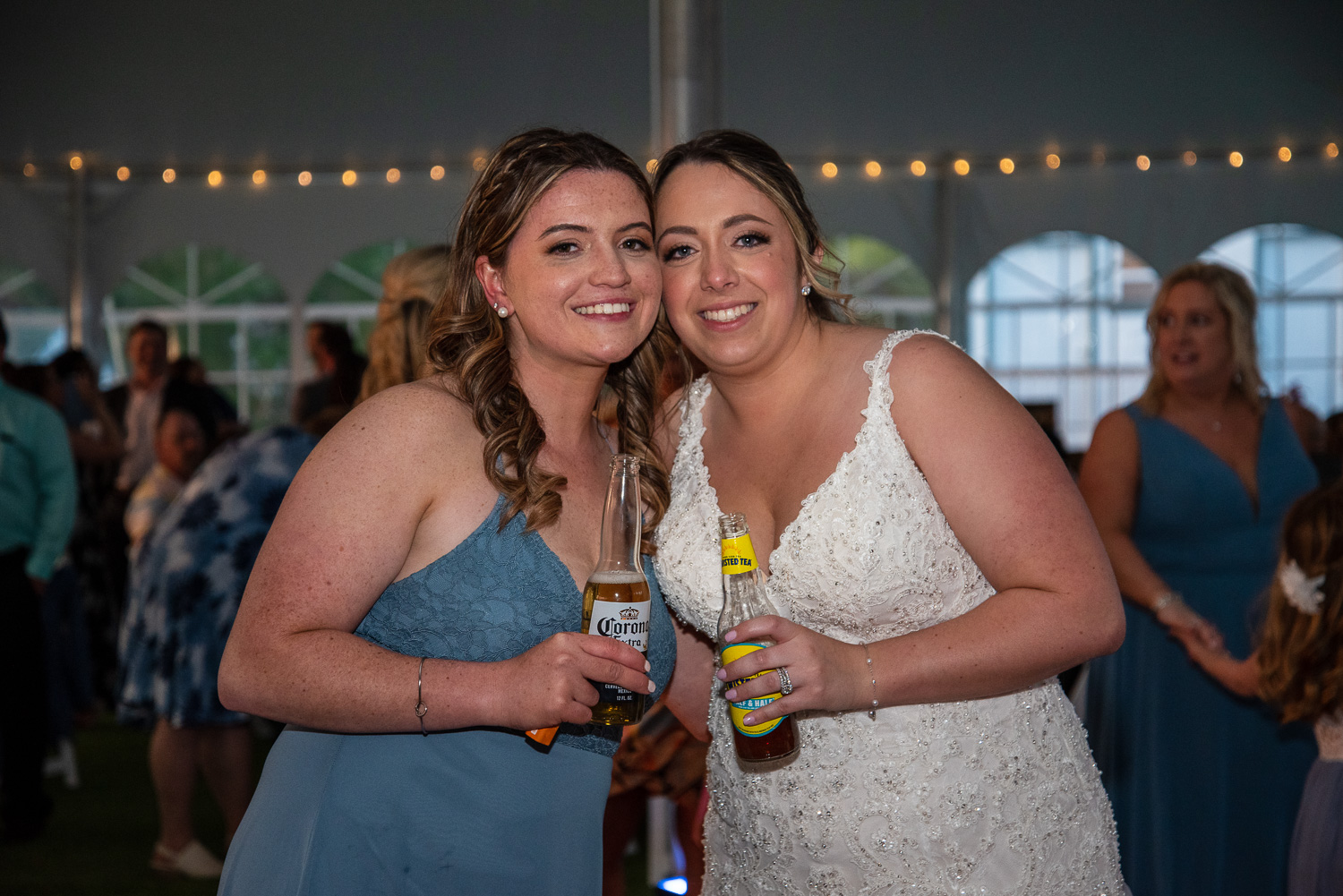 Bride and a guest at the lakeside wedding