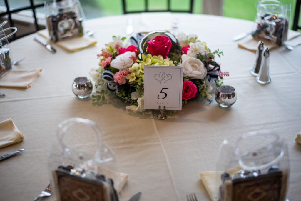 floral centerpiece at a beautiful wedding with a view
