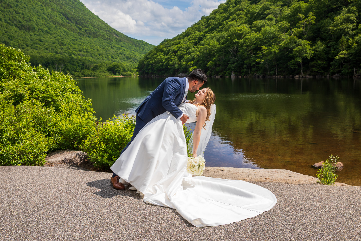 Bride and groom at Old Man on the Mountain viewing area